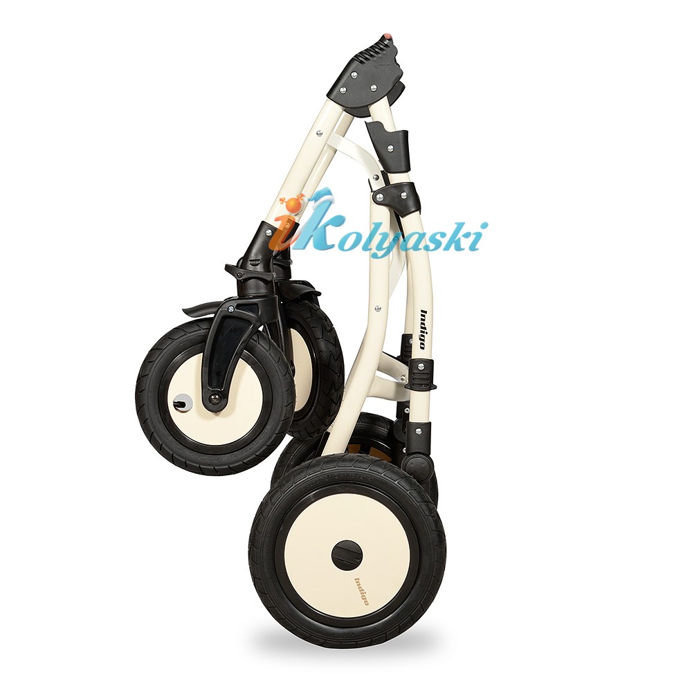 Детская универсальная коляска Slaro Indigo 17 S,  коляска 2 в 1, люлька из эко-кожи, шасси на передних поворотных колесах на 360 градусов, колеса надувные, производство Польша . Детская коляска Сларо Индиго, шасси компактно складывается